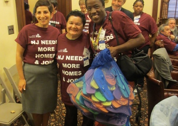 Staci, Myrta, and Tonya with the bag of flip flops!